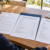 Rental property investor reviewing a lease, mortgage payment estimate and operating budget in a California home.